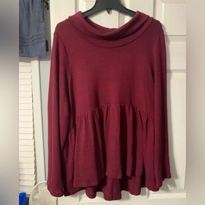 Color is Burgundy and causal dressy blouse made by Eyeshadow, XL. True to size.